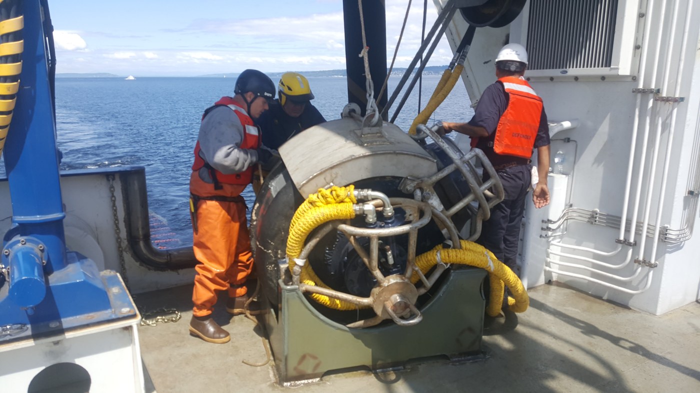 Crew on deck working on instrument deployment